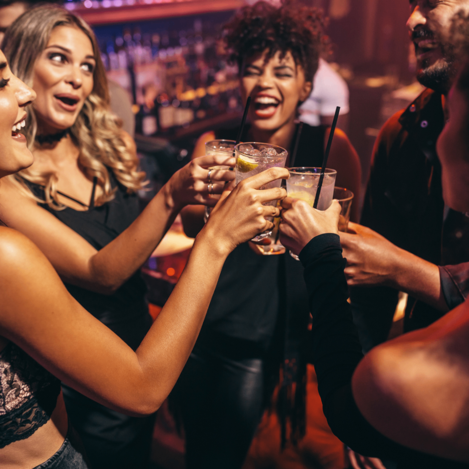Guests celebrating together with drinks at a party