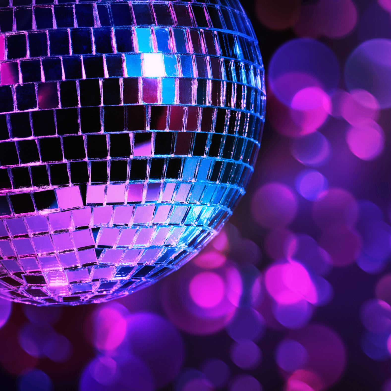 Neon-lit disco ball close-up